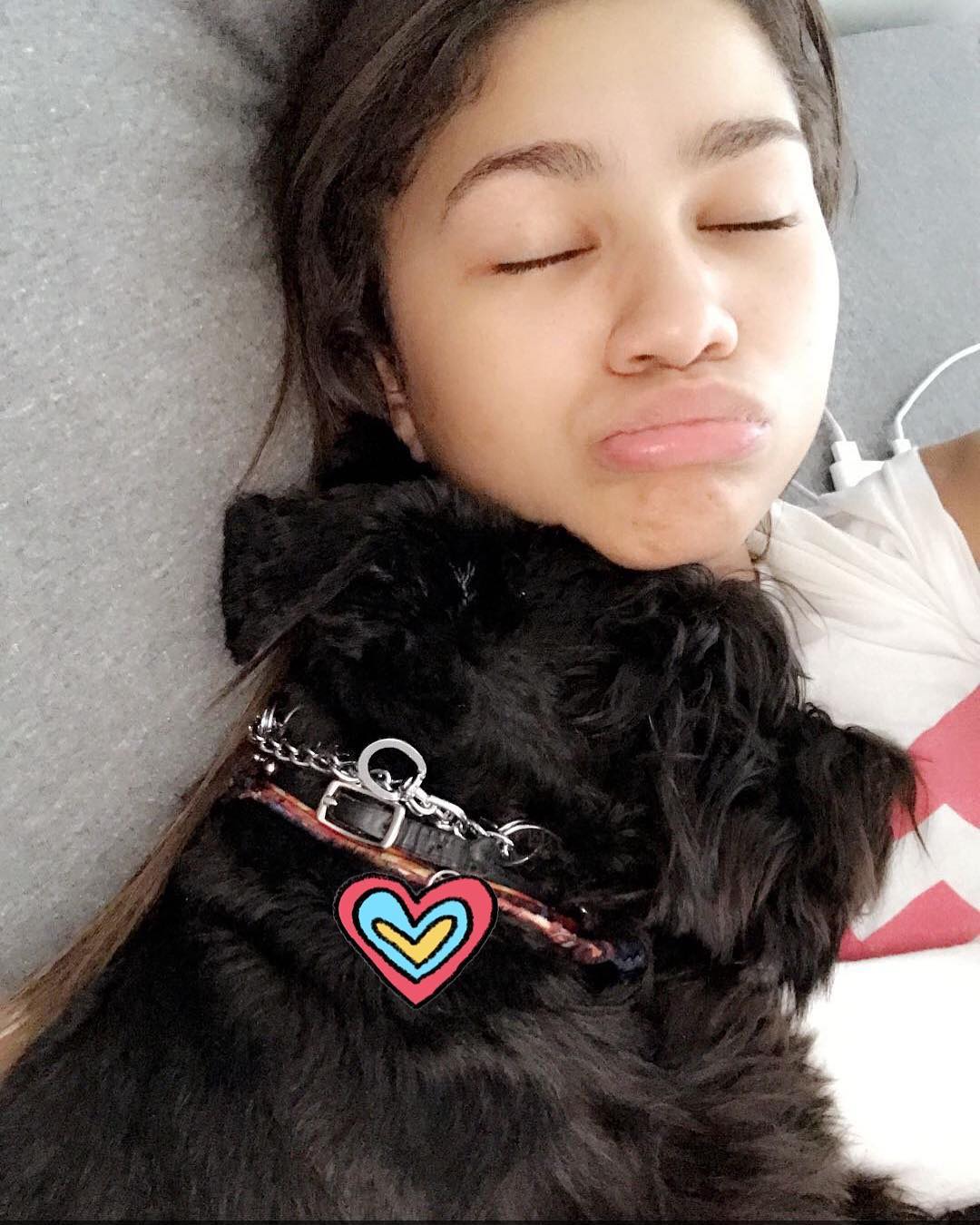 Zendaya and her dog Noon Coleman in bed