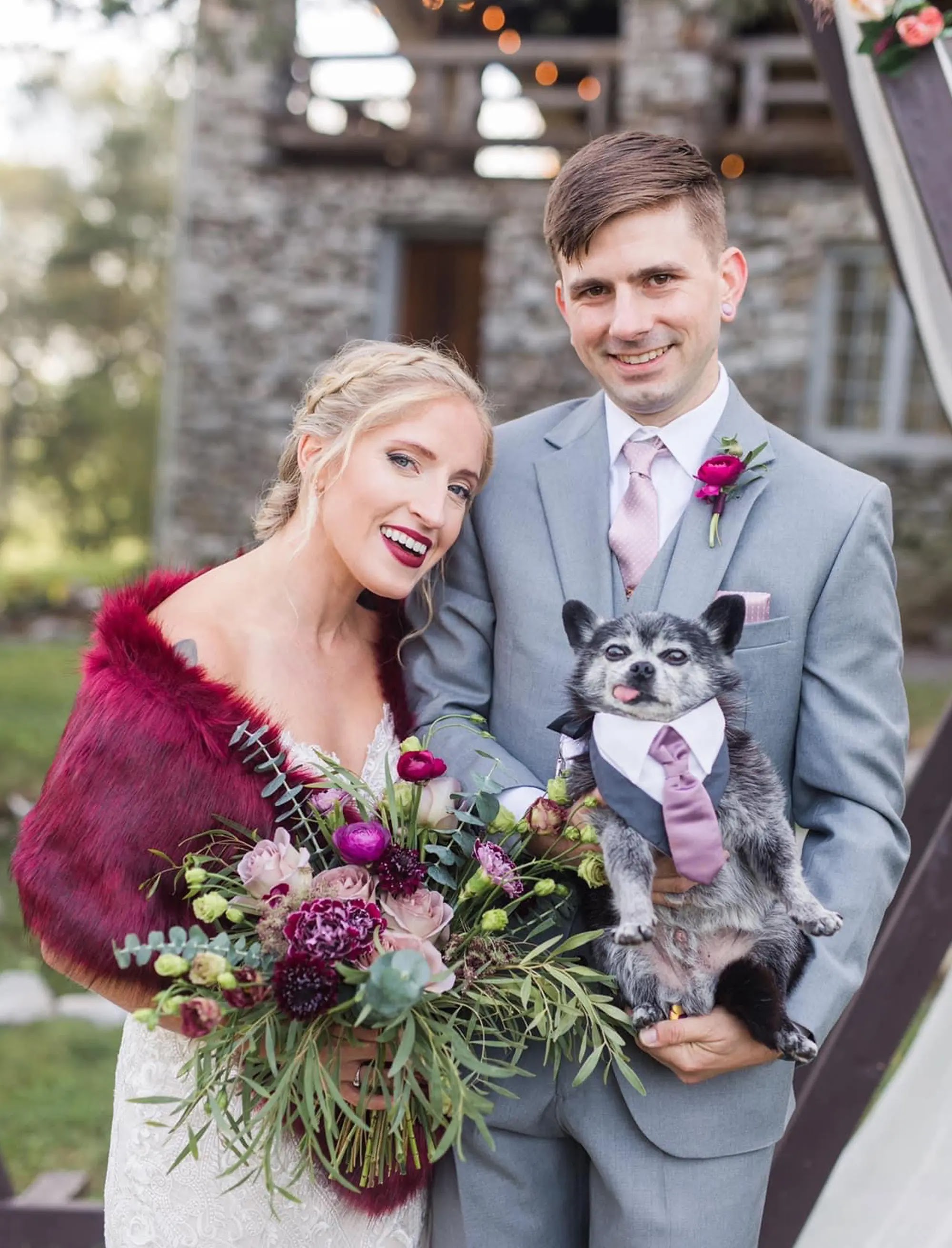 Dog wearing suit and tie at his owner’s wedding ceremony